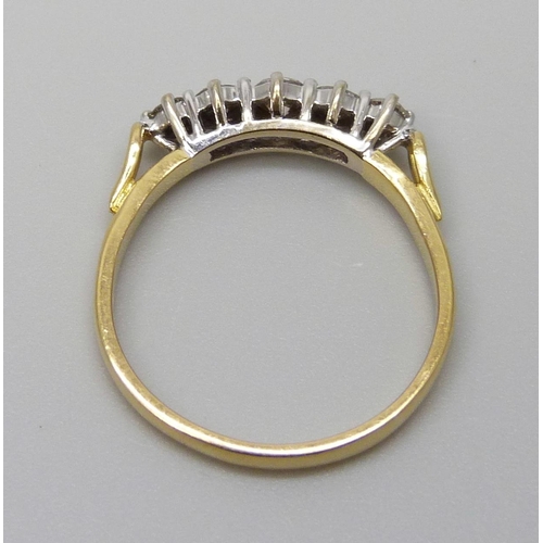 7042 - An 18ct gold five stone diamond ring, diamond weight 0.50 carat stamped to band, size N, 2.2g