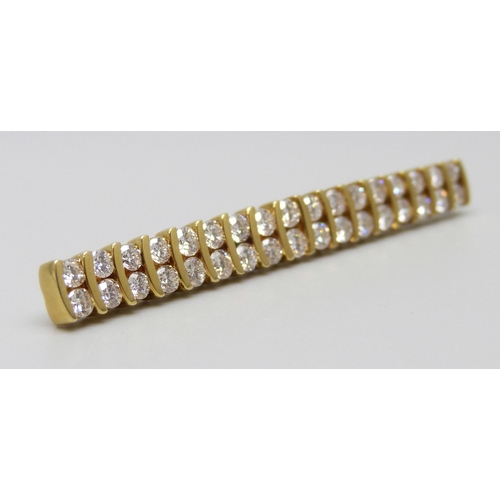 7043 - An 18ct gold double row diamond bar brooch/pin, diamonds 34 x 0.07ct, estimated total weight 2.50 ca... 