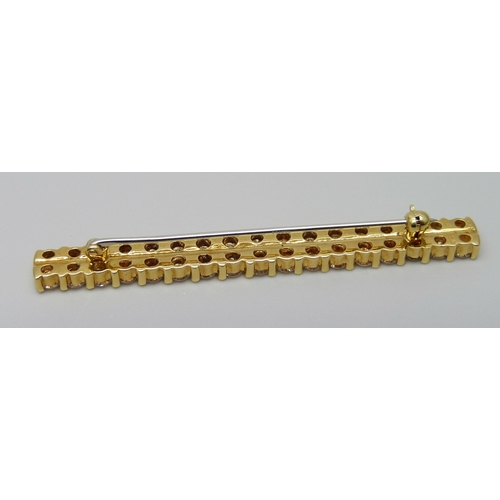 7043 - An 18ct gold double row diamond bar brooch/pin, diamonds 34 x 0.07ct, estimated total weight 2.50 ca... 