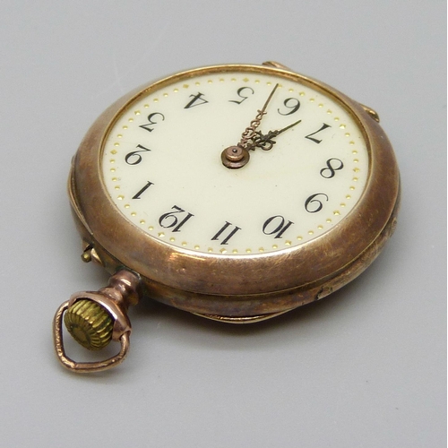 7044 - A 14ct gold fob watch, lacking glass, 18.1g total weight, 28mm diameter