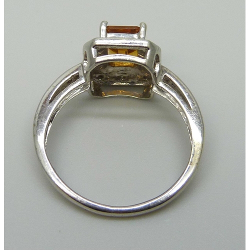 7055 - A 9ct white gold, citrine and diamond ring, 2.8g, K