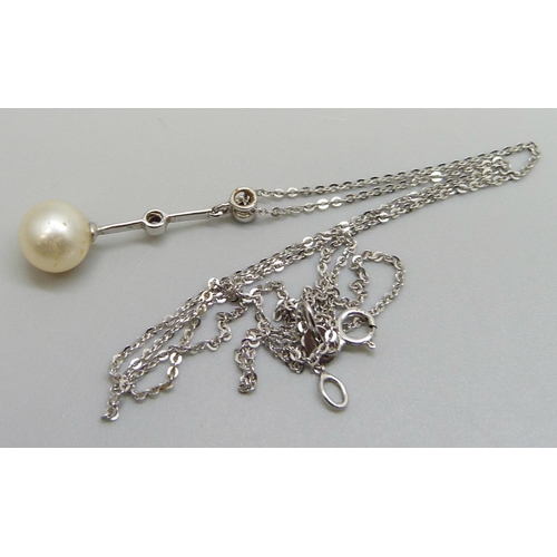 7060 - A 9ct white gold, diamond and pearl pendant on a fine 9ct white gold chain, 2.1g, chain 42cm