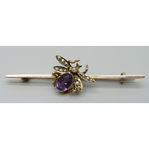 7065 - A Victorian yellow metal swallow brooch set with seed pearls, 1.9g, and a Victorian 9ct gold insect ... 