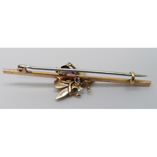 7065 - A Victorian yellow metal swallow brooch set with seed pearls, 1.9g, and a Victorian 9ct gold insect ... 