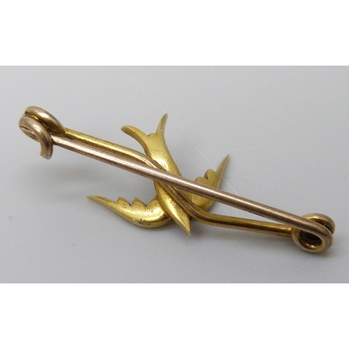 7065 - A Victorian yellow metal swallow brooch set with seed pearls, 1.9g, and a Victorian 9ct gold insect ... 