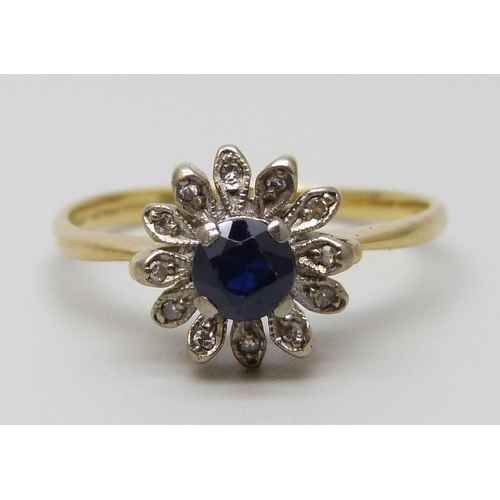 7070 - An 18ct gold, sapphire and diamond cluster ring, 3.2g, Q