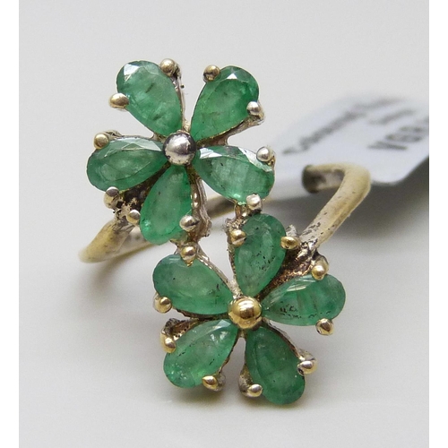 7071 - A silver gilt double cluster emerald ring, J