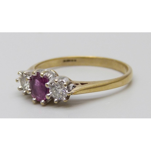 7073 - A 9ct gold, amethyst and diamond trilogy ring, 1.7g, N