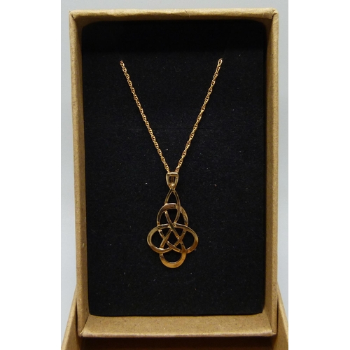 7084 - A 9ct gold Celtic style pendant and chain, 1.4g