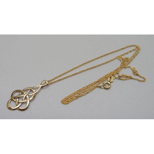 7084 - A 9ct gold Celtic style pendant and chain, 1.4g