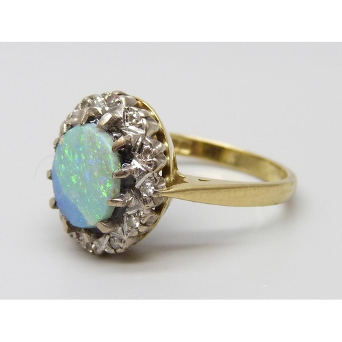 7089 - An 18ct gold, opal and diamond ring, 5.1g, N