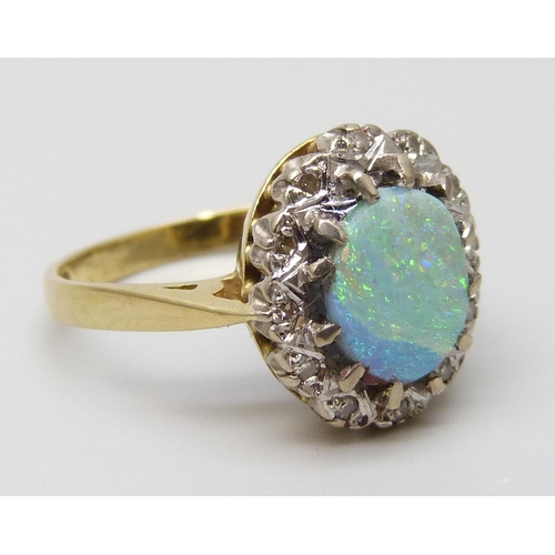 7089 - An 18ct gold, opal and diamond ring, 5.1g, N