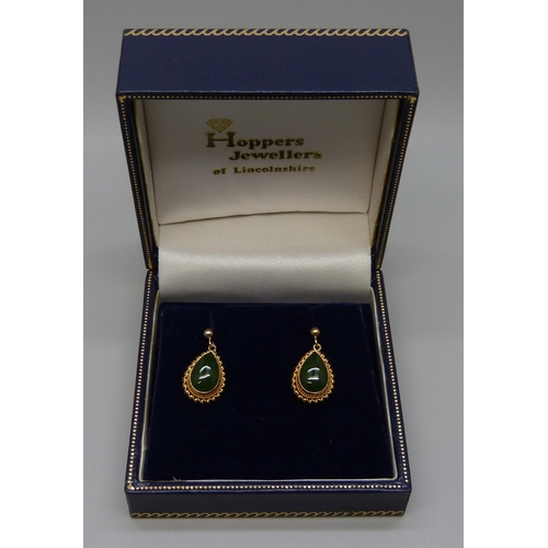 7098 - A pair of 9ct gold and nephrite earrings, boxed