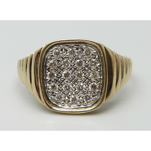 7100 - A 9ct gold pave set diamond ring, 4.2g, U