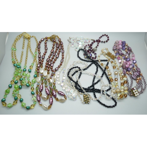 7119 - A collection of vintage glass necklaces