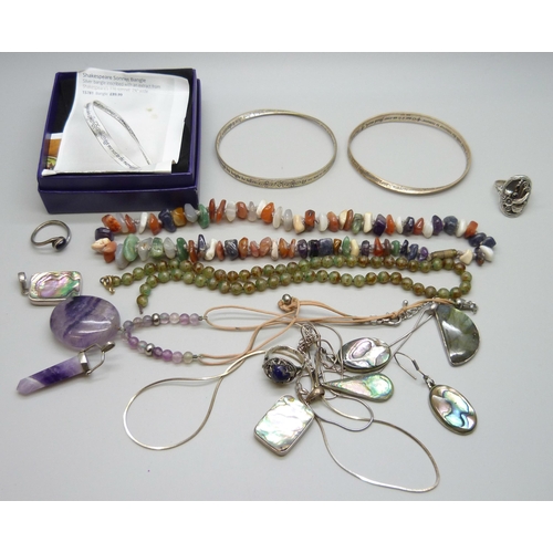 7144 - Two silver bangles, 28g, a silver ring, silver and abalone pendants, gemstone jewellery and other wh... 