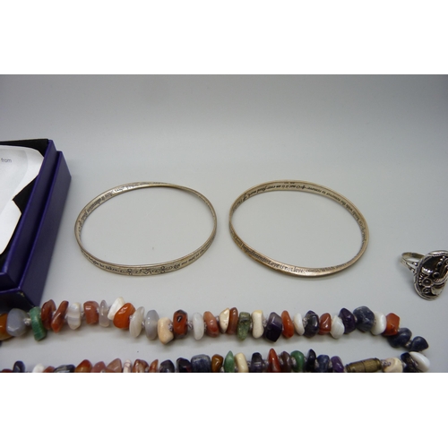 7144 - Two silver bangles, 28g, a silver ring, silver and abalone pendants, gemstone jewellery and other wh... 