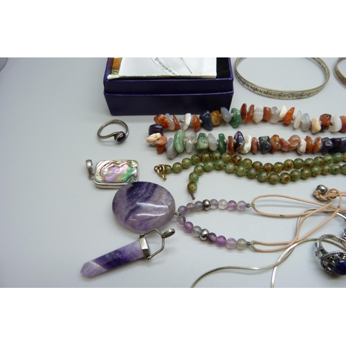 7144 - Two silver bangles, 28g, a silver ring, silver and abalone pendants, gemstone jewellery and other wh... 