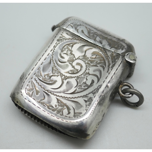 7267 - An engraved silver vesta case, Birmingham 1908