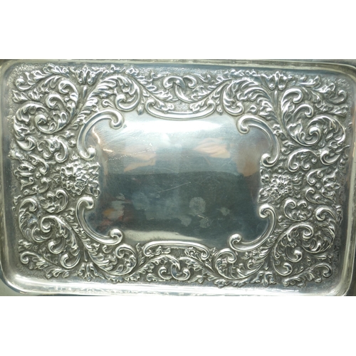 7268 - An embossed silver tray, hallmark worn, 268g, 20cm x 28.5cm