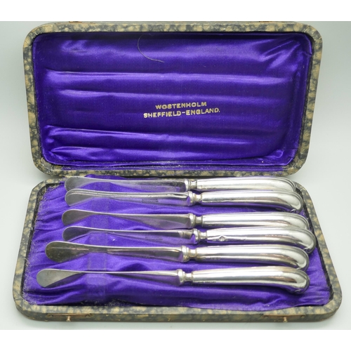 7270 - A cased set of six silver handled pistol grip knives