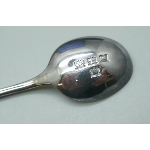 7274 - A cased set of six plated coffee bean spoons and four Georgian silver spoons, 76g