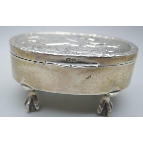 7275 - A silver jewellery box, embossed lid, Chester 1903, 104g, 9cm wide