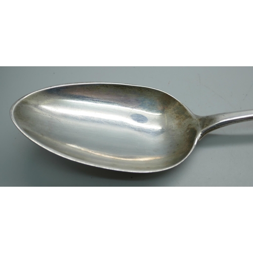 7279 - A large silver basting spoon, maker William Eaton, London 1828, 129g