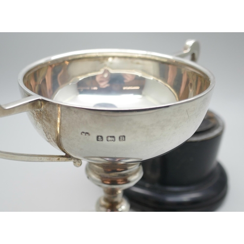 7280 - A silver two handled trophy on a stand, Birmingham 1926, 84g