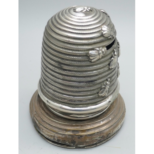 7283 - A German silver bee hive money box, 83g, 8.5cm