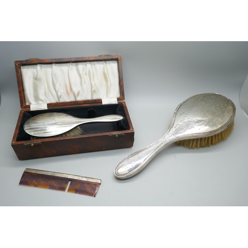 7287 - A 1940s silver backed brush, boxed and one other