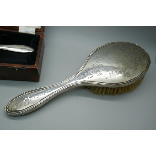 7287 - A 1940s silver backed brush, boxed and one other