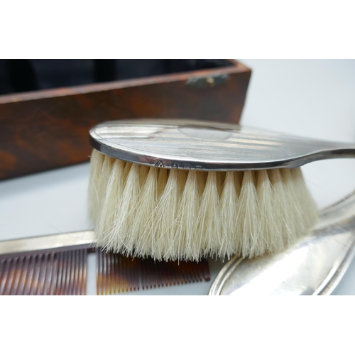 7287 - A 1940s silver backed brush, boxed and one other