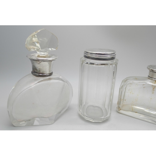 7288 - Two silver mounted Art Deco scent bottles, Birmingham 1929 and London 1923, one other scent bottle a... 