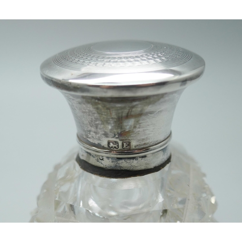 7288 - Two silver mounted Art Deco scent bottles, Birmingham 1929 and London 1923, one other scent bottle a... 