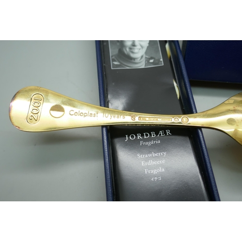 7291 - A Georg Jensen 2001 silver gilt spoon, strawberry,  Coloplast 10 Years, boxed