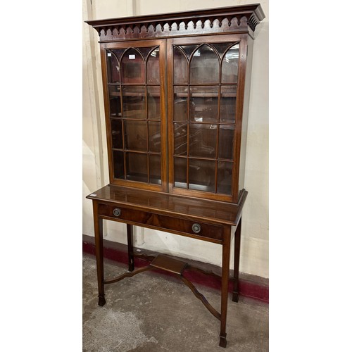 187 - An Edward VII mahogany bookcase on stand