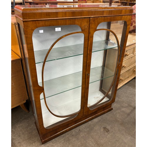 234 - An Art Deco walnut display cabinet