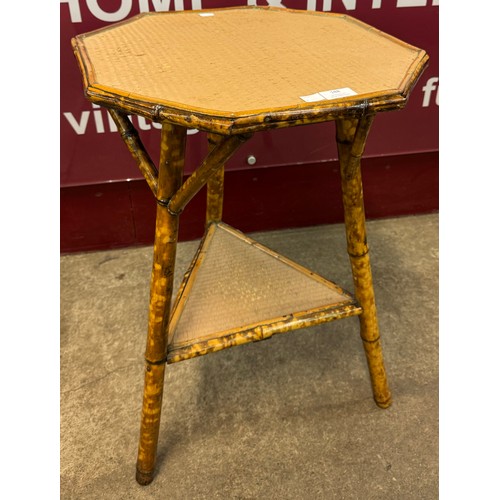 188 - A Victorian Aesthetic Movement octagonal bamboo and rattan occasional table