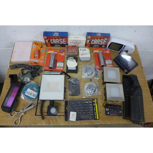 5246 - A bag of miscellaneous household items including outdoor lights, welding mask, dash cam, mini torch,... 