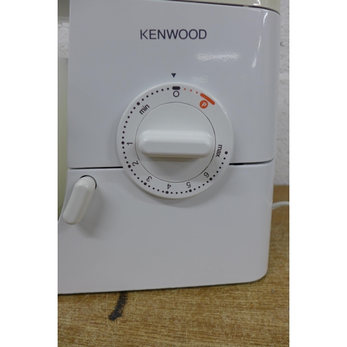 5272 - A Kenwood KM33 kitchen mixer with bowl and mixing paddles and soft cover