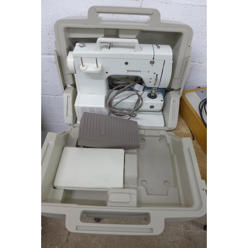 5274 - A Bernina 801 sport sewing machine with case and a Merritt sewing machine