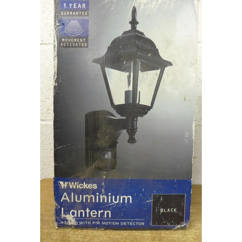 5282 - A box of assorted unused out door lighting