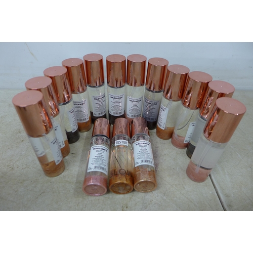 5286 - A box of 38 Revolution Glow radiance face and body shimmer oil 12ml per bottle * This lot is subject... 