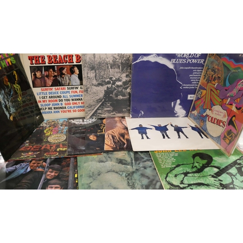 2106 - A collection of sixteen LP records, original 1960s pressings including The Beatles, Jimi Hendrix, Th... 