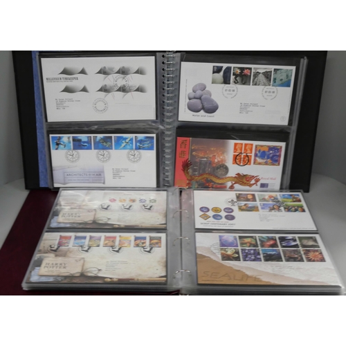 2116 - A large collection of stamps including London 2012 Team GB gold medal collection, Royal Family stamp... 