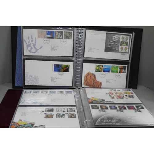 2116 - A large collection of stamps including London 2012 Team GB gold medal collection, Royal Family stamp... 