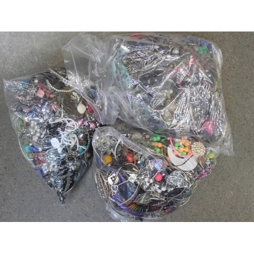 2124 - Three bags of costume jewellery