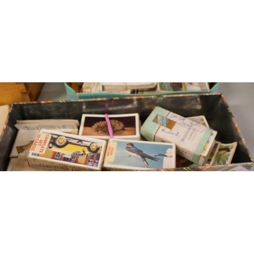 2165 - A collection of cigarette cards, tea card albums including 1930s football