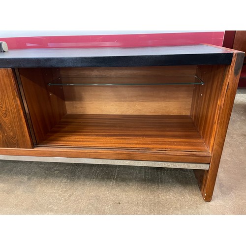 11 - A Merrow Associates rosewood, chrome and black vinyl topped sideboard. CITES A10 no. 24GBA10N1TEFQ